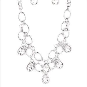 NWT rhinestone necklace with matching earrings.